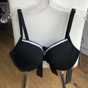Black bikini top with white trim.